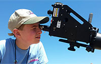 student using a spectroscope